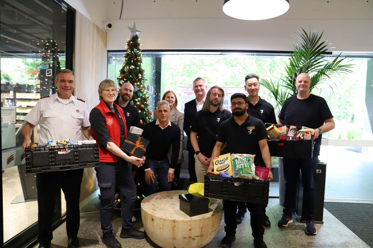 Major Brendan Nottle, Sandra Nottle, Fiona Hayes, Matt Keogh and members of the Product Team with food for donation