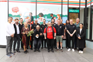 Image of team members and guests at opening of 7-Eleven Bowen Hills